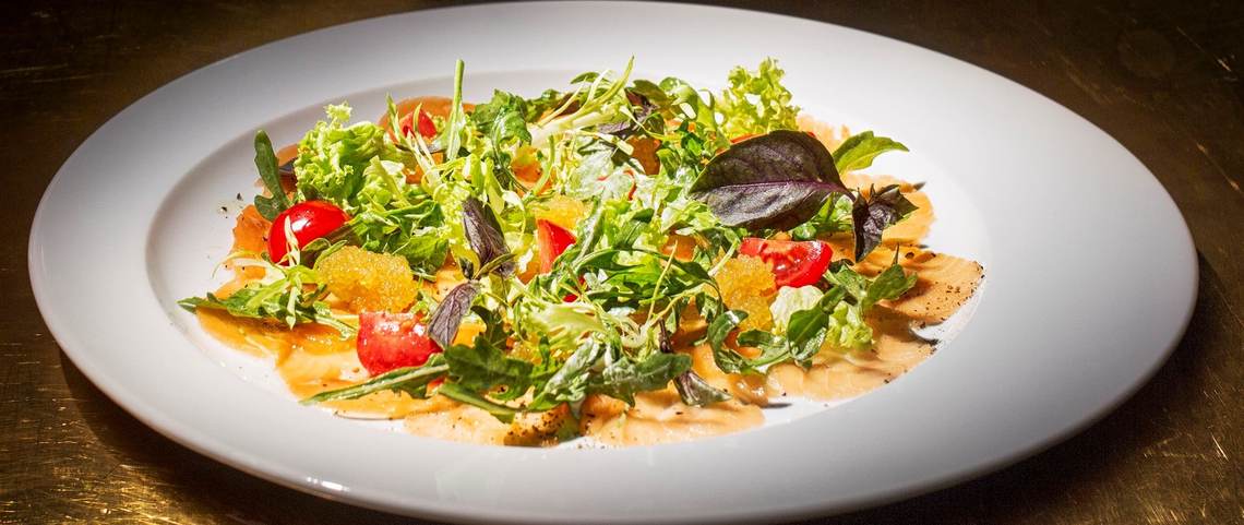 salmon-carpaccio-with-pike-caviar-and-salad-leaves-served-with-sour-cream-dressing.jpg